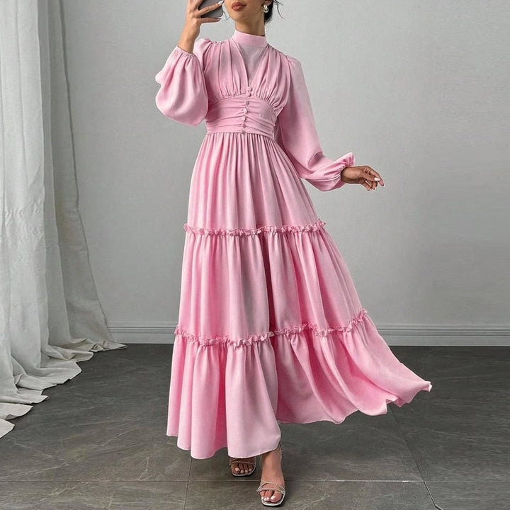 Damer Maxi Klänning med Eleganta Volangdetaljer och Samlad Topp-Eva Jonsson