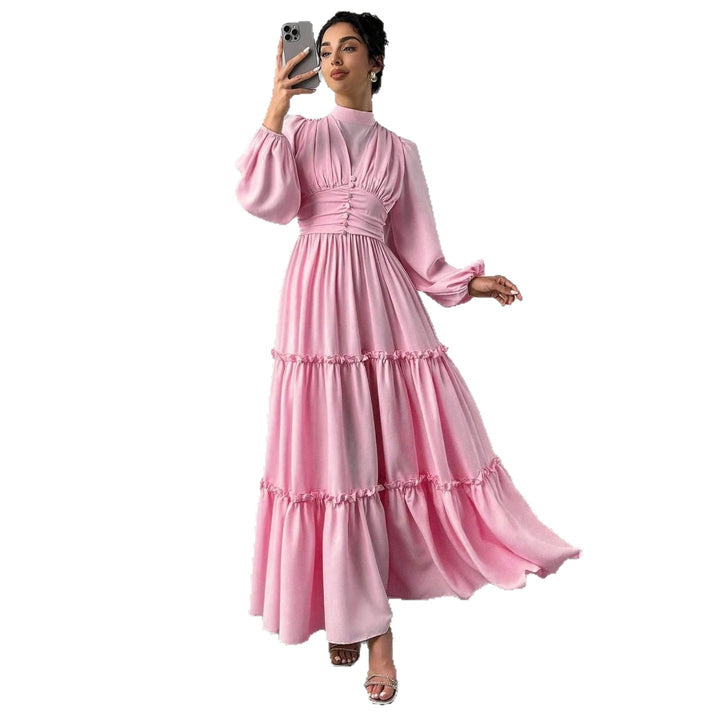 Damer Maxi Klänning med Eleganta Volangdetaljer och Samlad Topp-Eva Jonsson