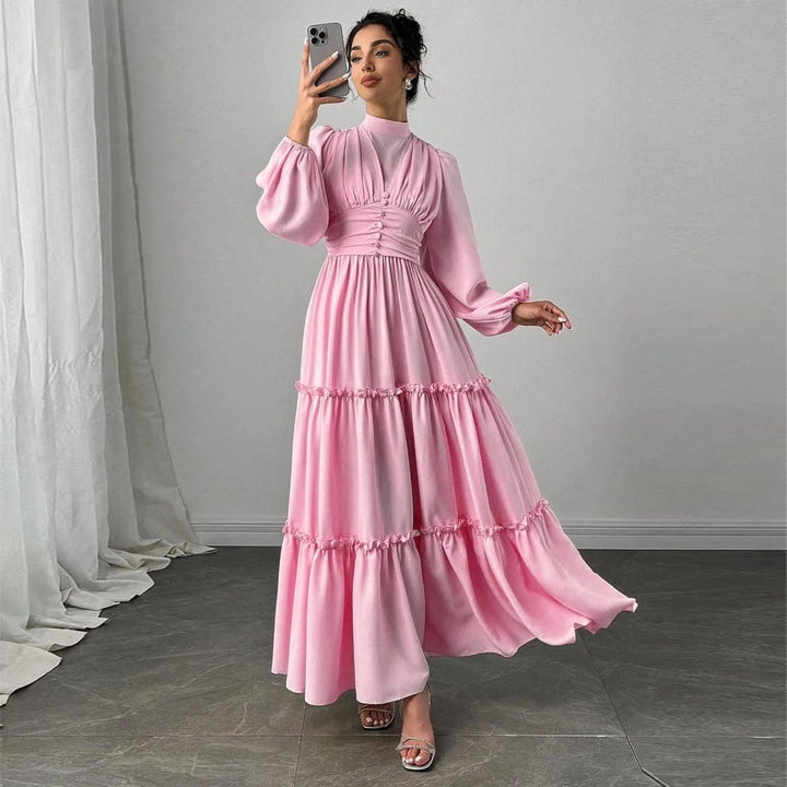 Damer Maxi Klänning med Eleganta Volangdetaljer och Samlad Topp-Eva Jonsson