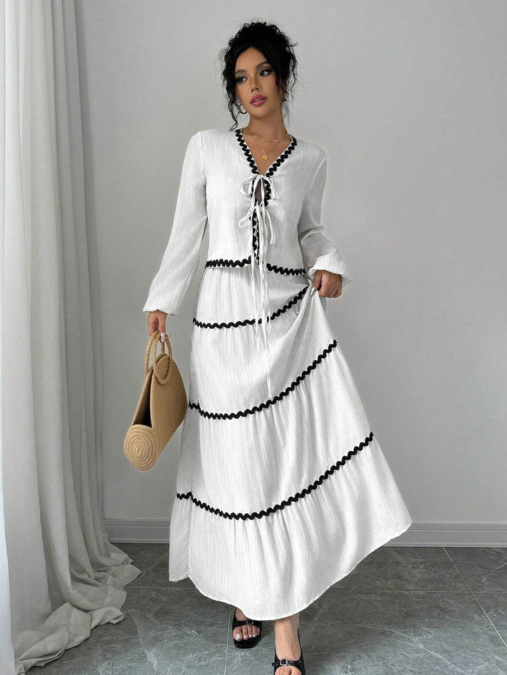Damer Maxi-klänning med lekfull snörning och elegant volangbotten Eva Jonsson-Eva Jonsson