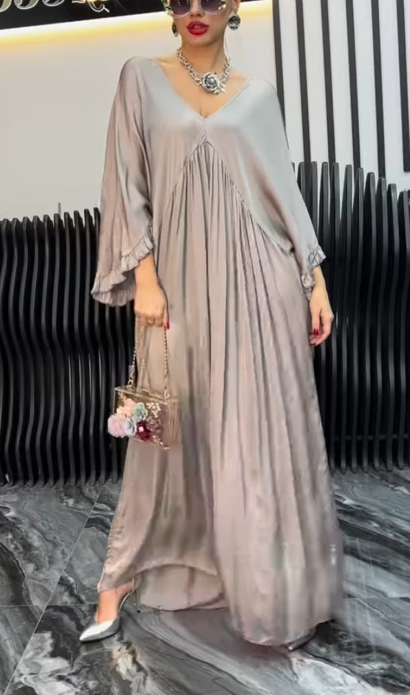 Damer Maxi-klänning med löst skuren design och elegant V-urringning Eva Jonsson-Eva Jonsson