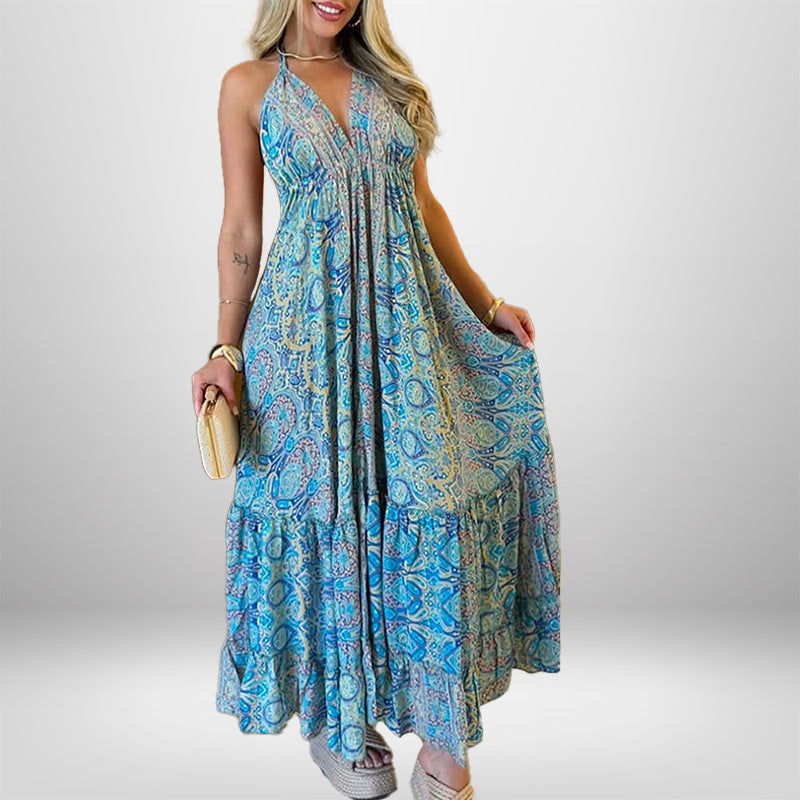 Damer Maxiklänning i lekfull boho-stil med djup V-ringning och svängande kjol Mirla-Eva Jonsson