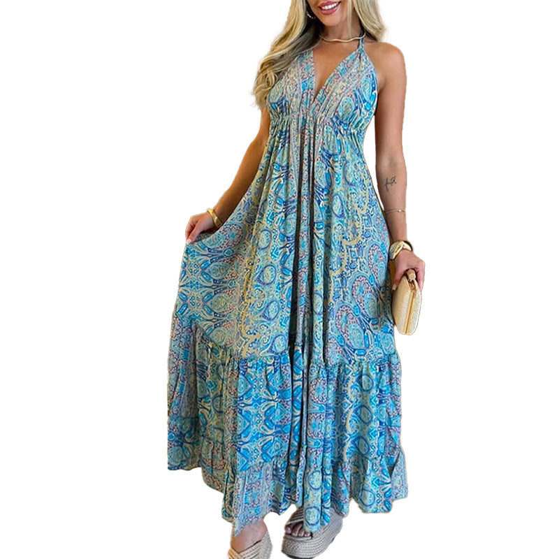Damer Maxiklänning i lekfull boho-stil med djup V-ringning och svängande kjol Mirla-Eva Jonsson