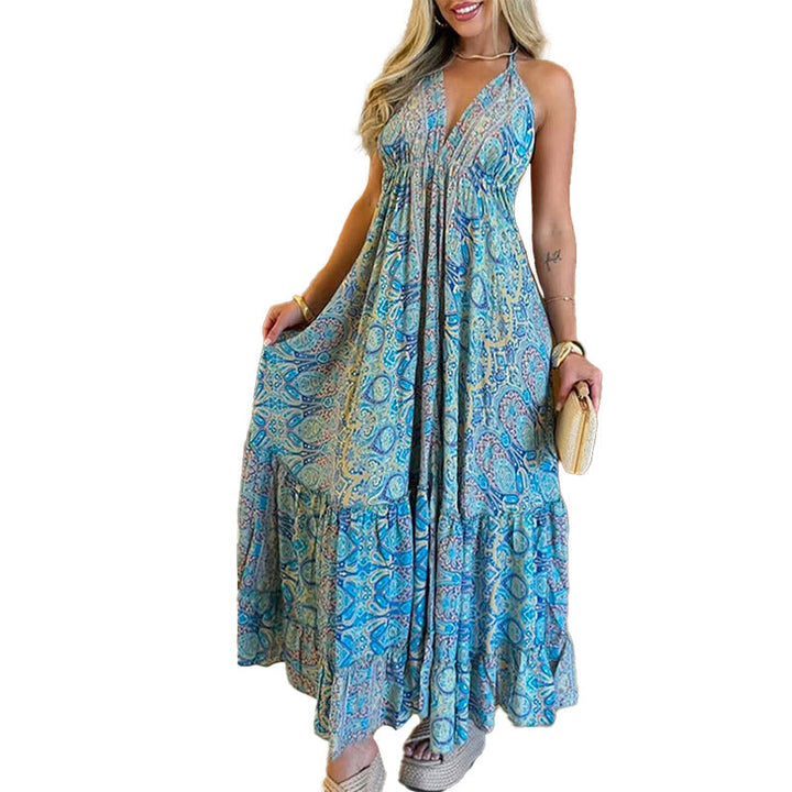 Damer Maxiklänning i lekfull boho-stil med djup V-ringning och svängande kjol Mirla-Eva Jonsson