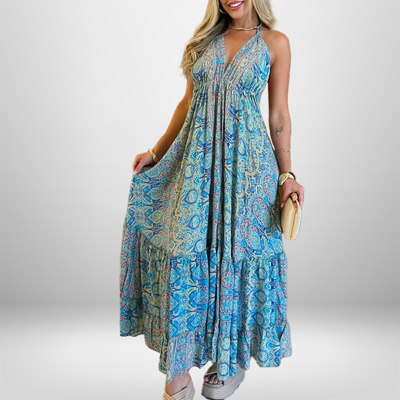 Damer Maxiklänning i lekfull boho-stil med djup V-ringning och svängande kjol Mirla-Eva Jonsson