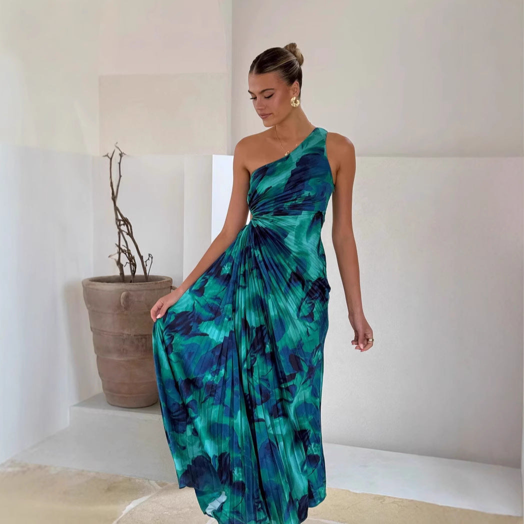 Damer Maxiklänning med Asymmetrisk Skärning och Eleganta Fällor Mirla-Eva Jonsson