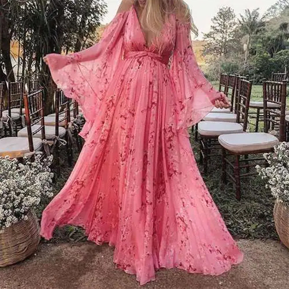 Damer Maxiklänning med Svängande Ärmar och Blommigt Mönster Mirla-Eva Jonsson