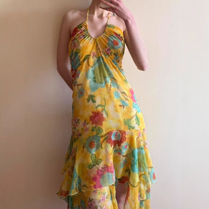 Damer Maxiklänning med blommigt lagerutseende och spaghetti-band Mirla-Eva Jonsson