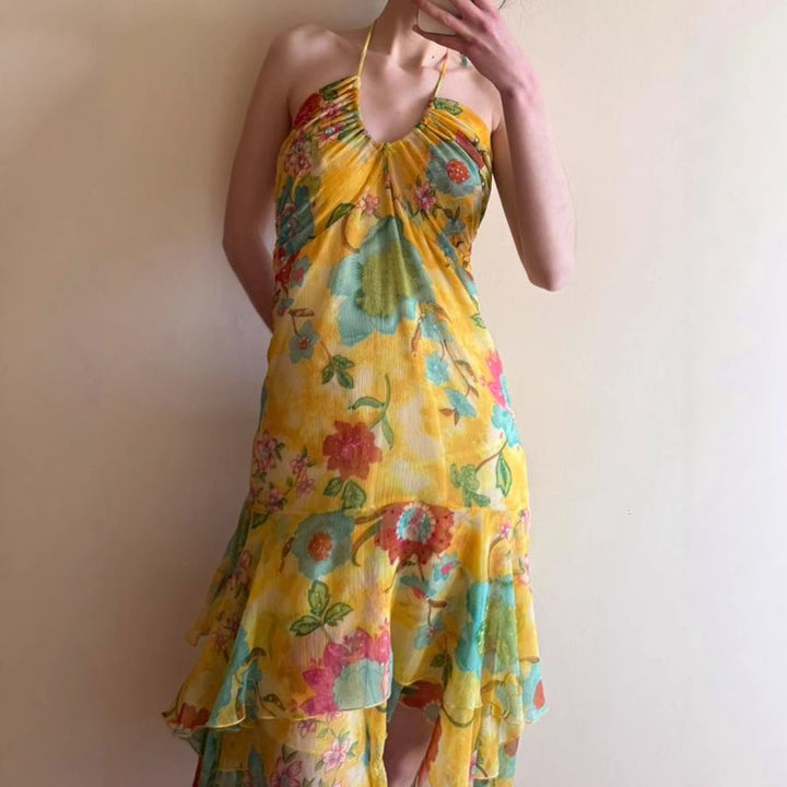 Damer Maxiklänning med blommigt lagerutseende och spaghetti-band Mirla-Eva Jonsson