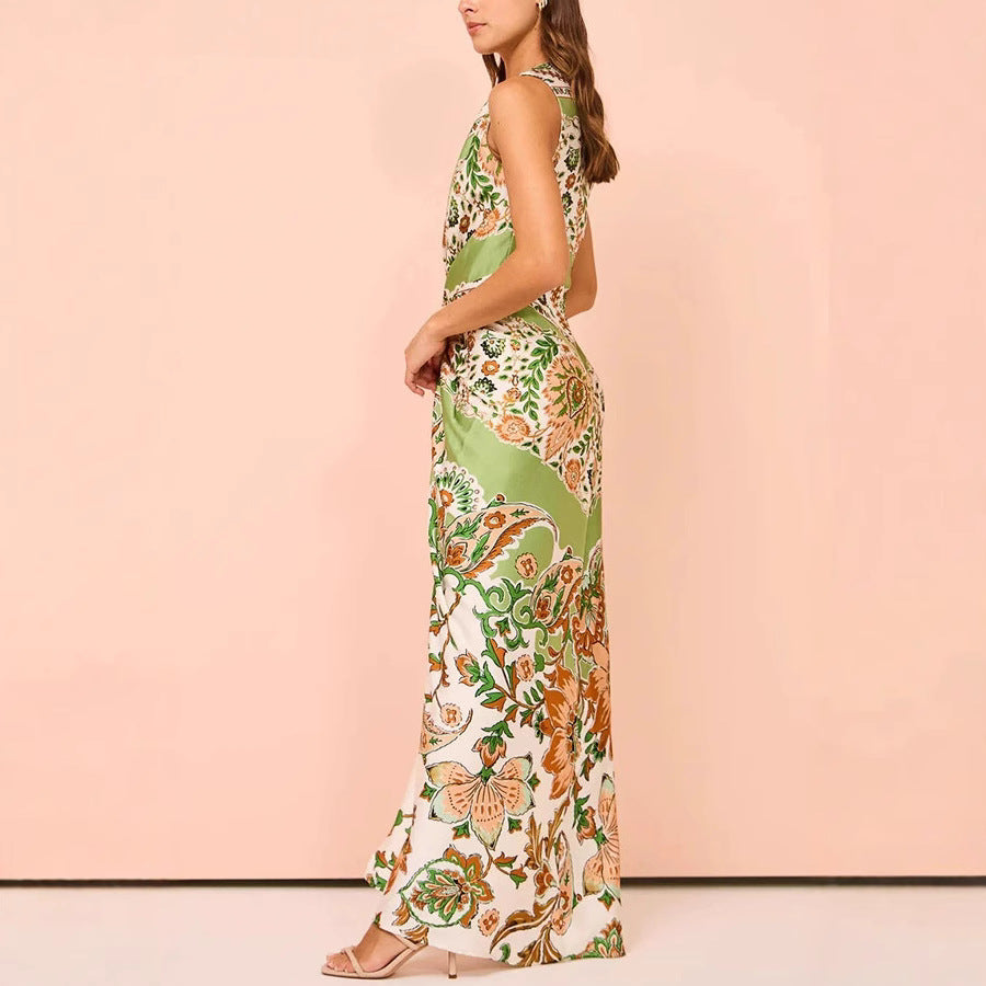 Damer Maxiklänning med blommönster och elegant knutdetalj Eva Jonsson-Eva Jonsson