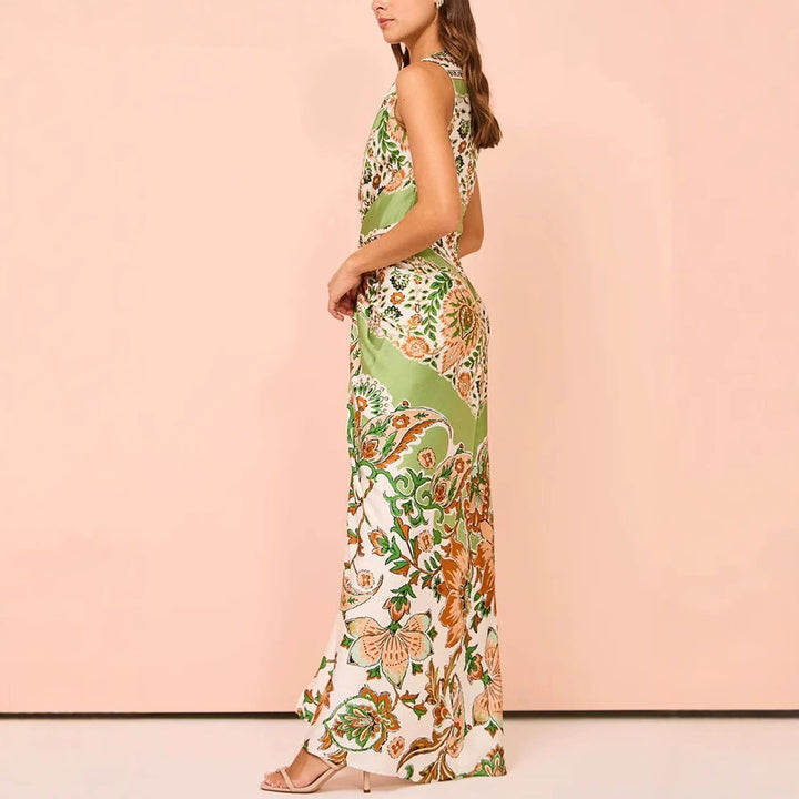 Damer Maxiklänning med blommönster och elegant knutdetalj Eva Jonsson-Eva Jonsson