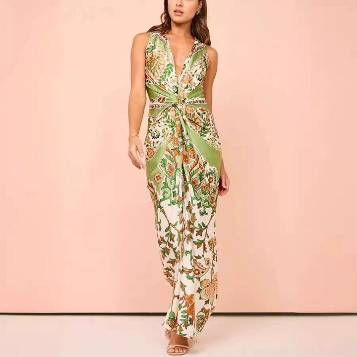 Damer Maxiklänning med blommönster och elegant knutdetalj Eva Jonsson-Eva Jonsson