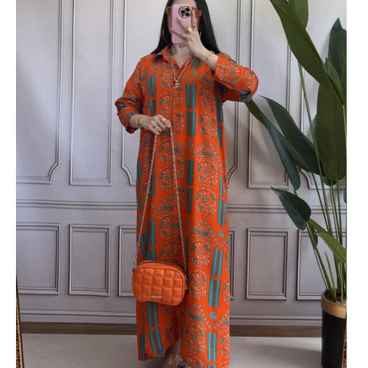 Damer Maxiklänning med blommönster och knapprubrik Mirla-Eva Jonsson