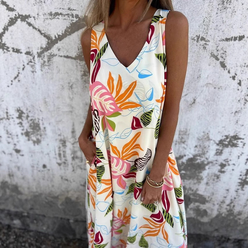 Damer Maxiklänning med blommönster och praktiska sidfickor Mirla-Eva Jonsson