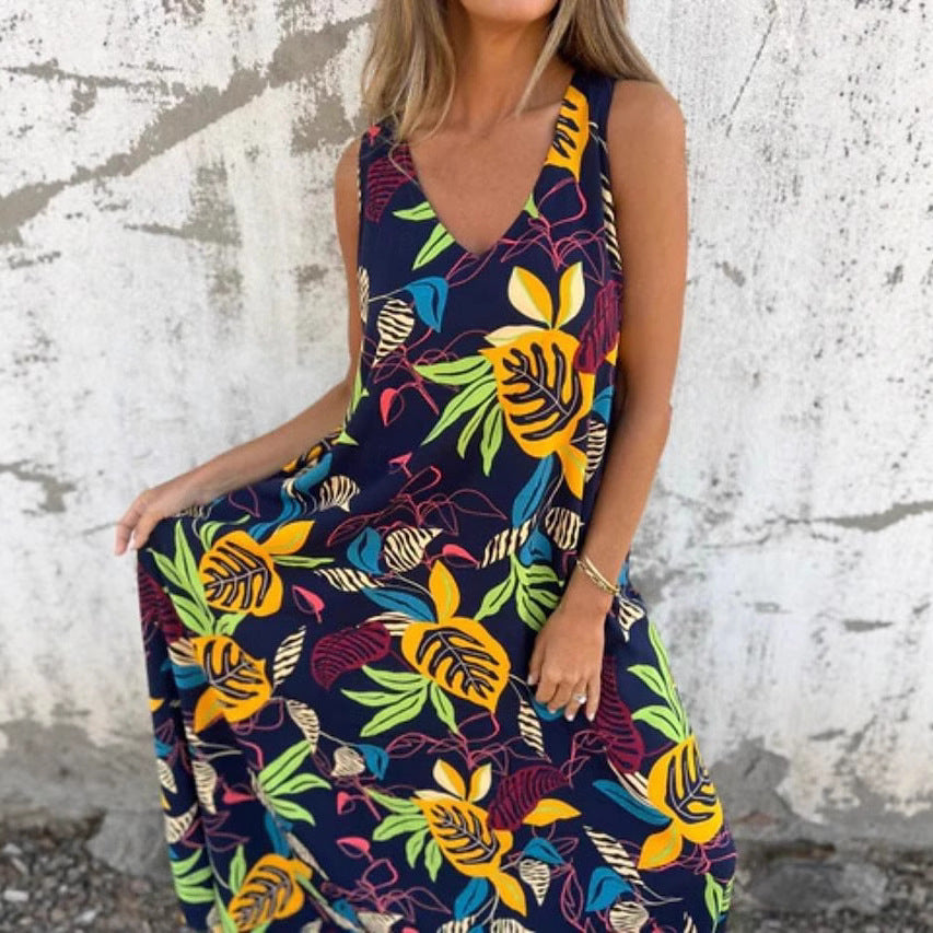 Damer Maxiklänning med blommönster och praktiska sidfickor Mirla-Eva Jonsson