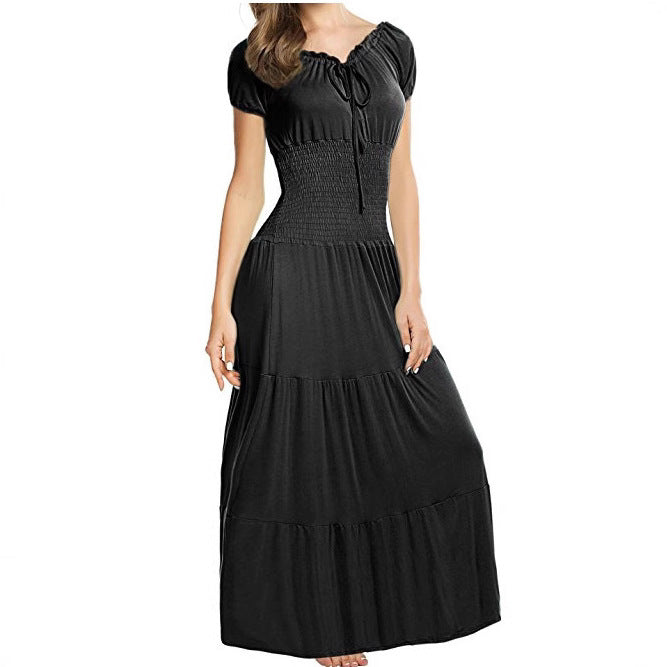 Damer Maxiklänning med elastisk midja och lekfulla volanger Eva Jonsson-Eva Jonsson