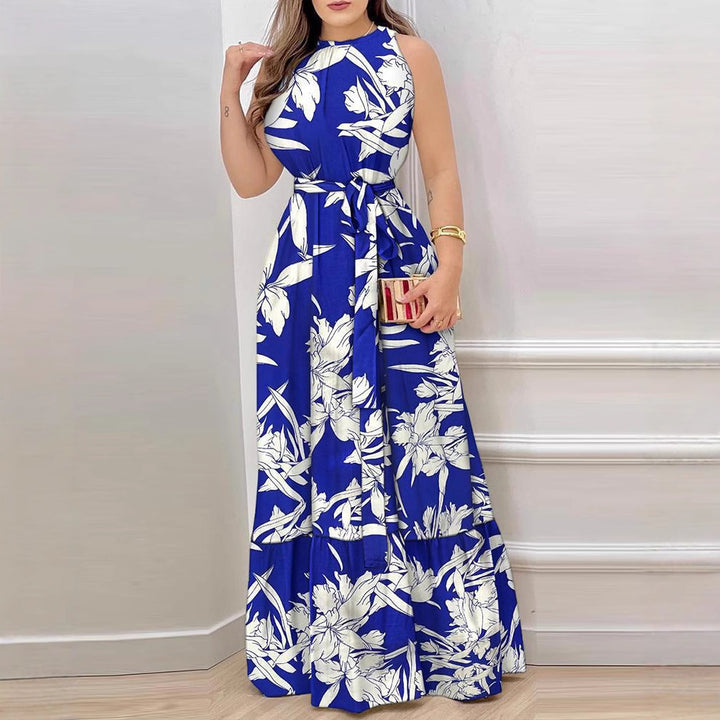 Damer Maxiklänning med elegant blommönster och svängande kjol Mirla-Eva Jonsson