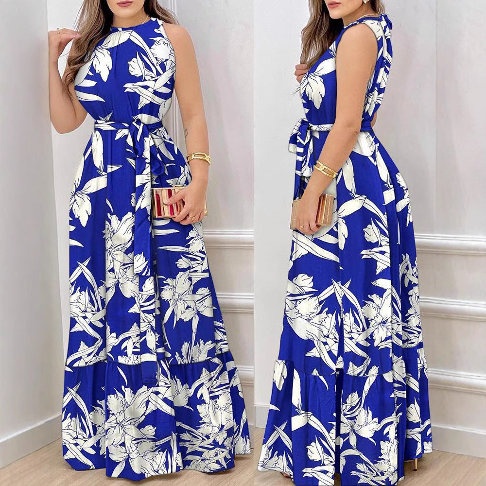 Damer Maxiklänning med elegant blommönster och svängande kjol Mirla-Eva Jonsson