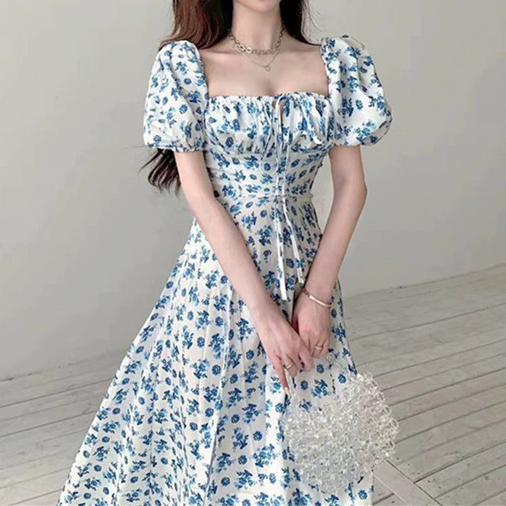 Damer Maxiklänning med eleganta puffärmar och blommigt mönster Eva Jonsson-Eva Jonsson