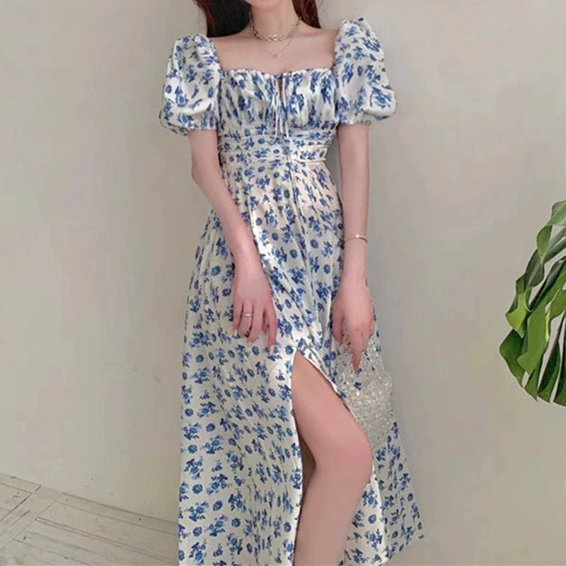 Damer Maxiklänning med eleganta puffärmar och blommigt mönster Mirla-Eva Jonsson