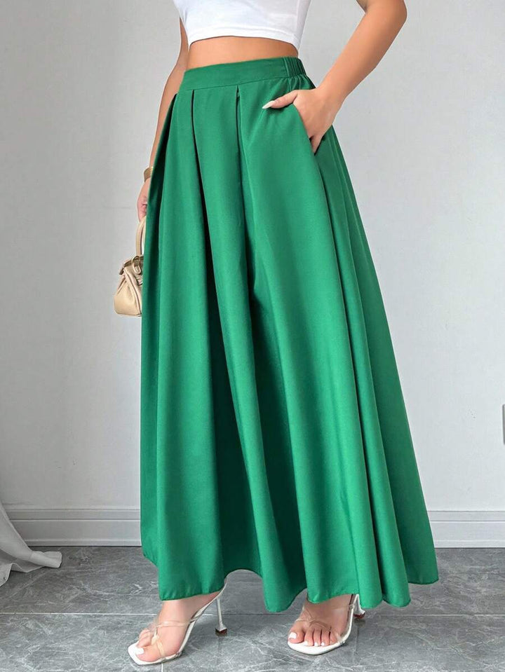 Damer Maxiklänning med eleganta veck och hög midja Mirla-Eva Jonsson