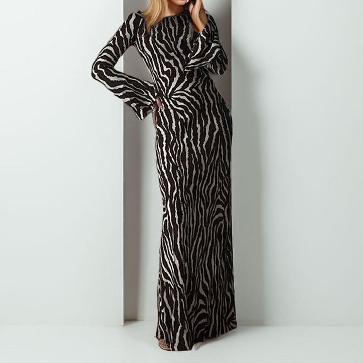 Damer Maxiklänning med en modern zebraprint och asymmetrisk skärning Mirla-Eva Jonsson