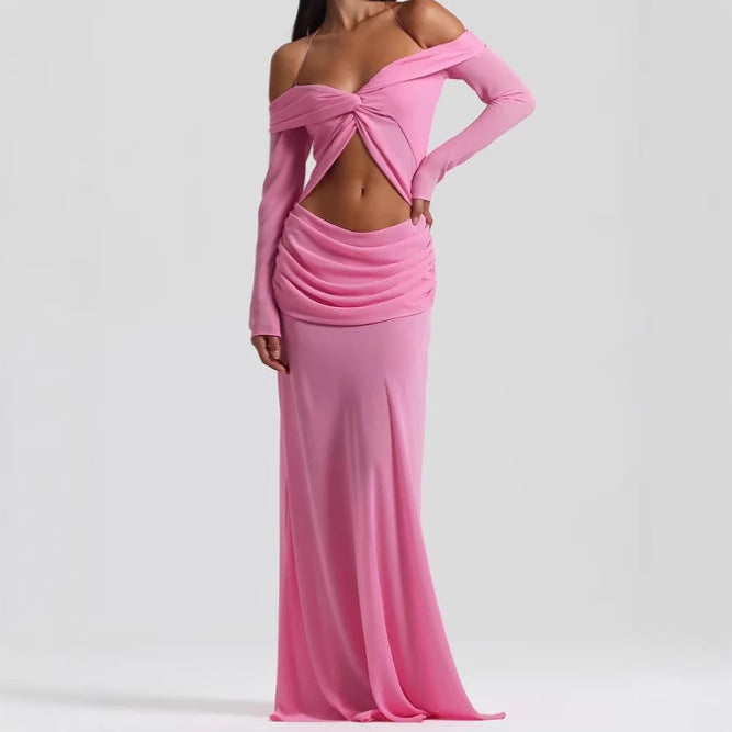 Damer Maxiklänning med raffinerad cut-out-design och elegant drapering Mirla-Eva Jonsson