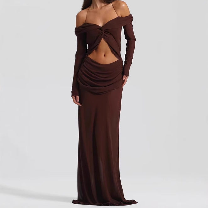 Damer Maxiklänning med raffinerad cut-out-design och elegant drapering Mirla-Eva Jonsson