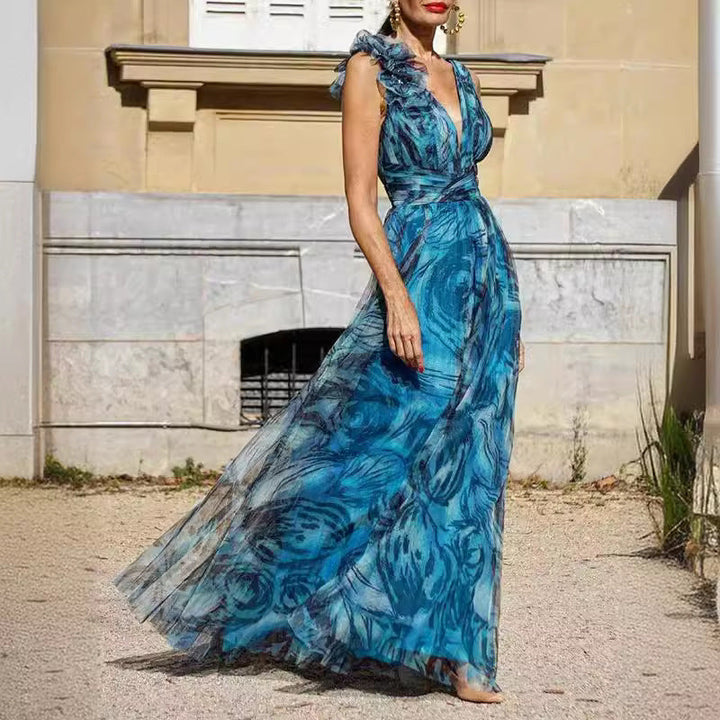 Damer Maxiklänning med romantiska volangärmar och blomster genomskinligt tyg Mirla-Eva Jonsson