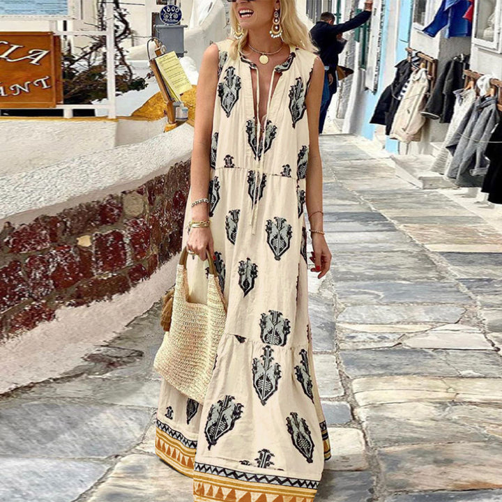 Damer Maxikleid med elegant blommönster och djup V-ringning Mirla-Eva Jonsson