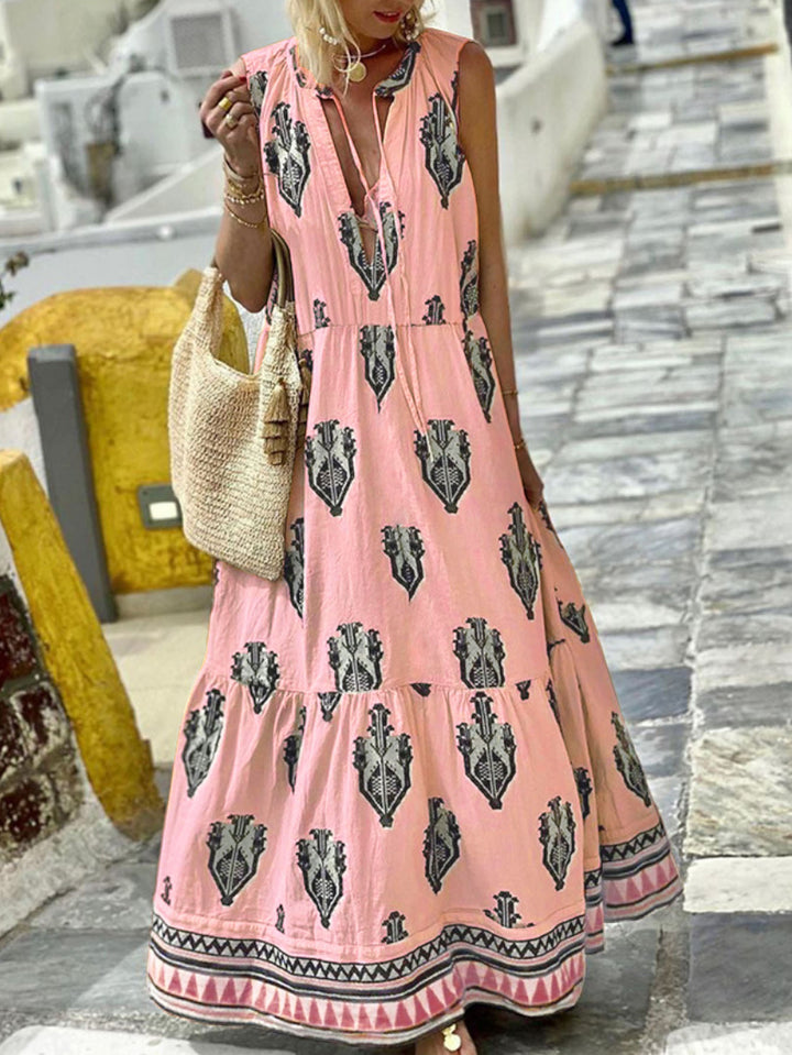Damer Maxikleid med elegant blommönster och djup V-ringning Mirla-Eva Jonsson