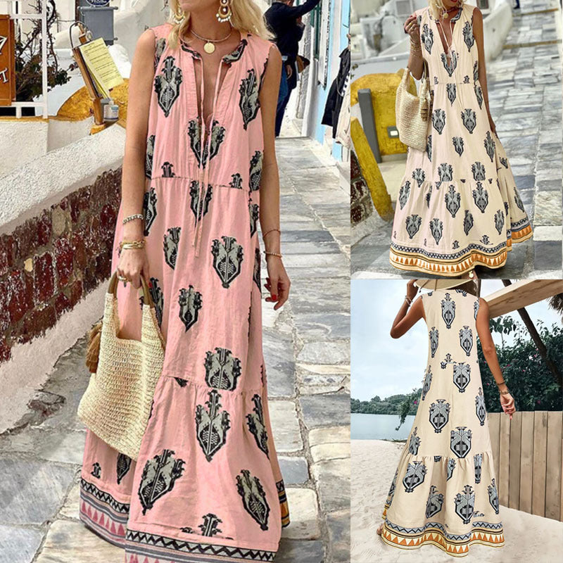 Damer Maxikleid med elegant blommönster och djup V-ringning Mirla-Eva Jonsson