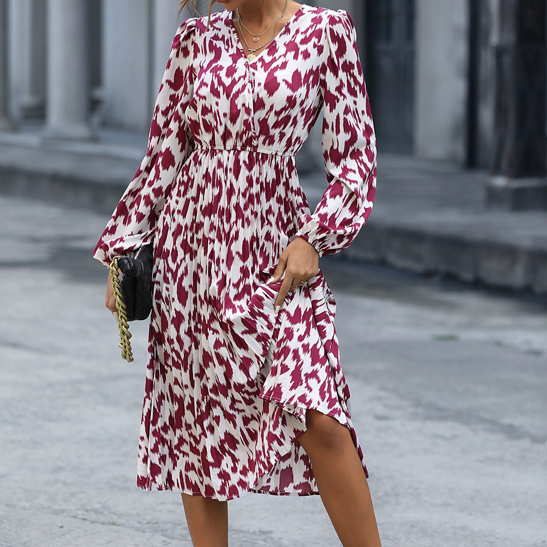 Damer Midi Klänning med Elegant V-Hals och Voluminösa Ärmar Mirla-Eva Jonsson