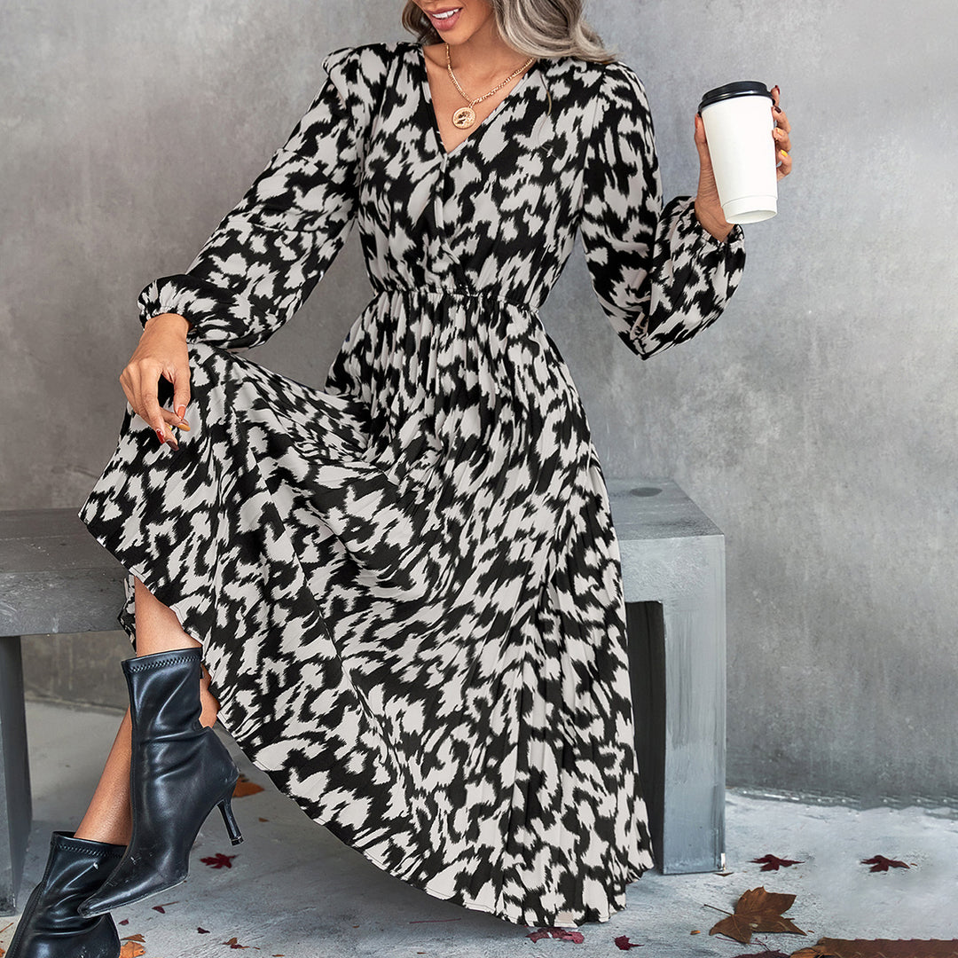 Damer Midi Klänning med Elegant V-Hals och Voluminösa Ärmar Mirla-Eva Jonsson
