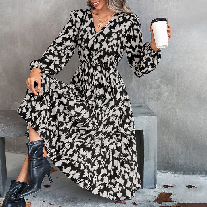 Damer Midi Klänning med Elegant V-Hals och Voluminösa Ärmar Mirla-Eva Jonsson