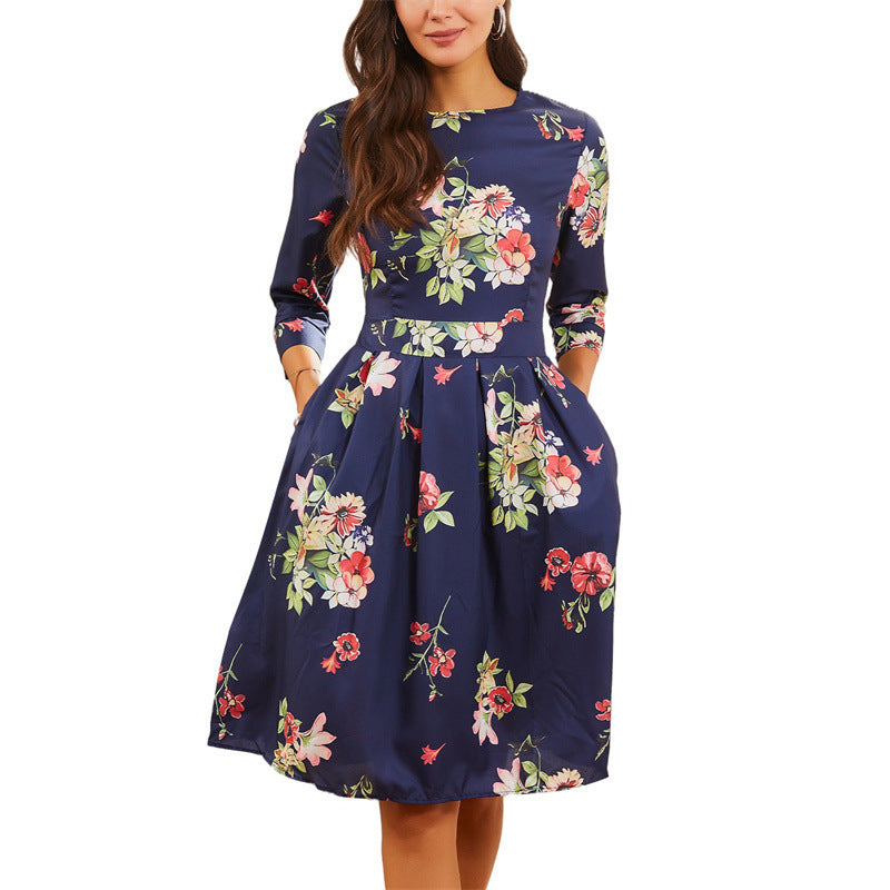Damer Midi-klänning med blommönster och praktiska fickor Mirla-Eva Jonsson