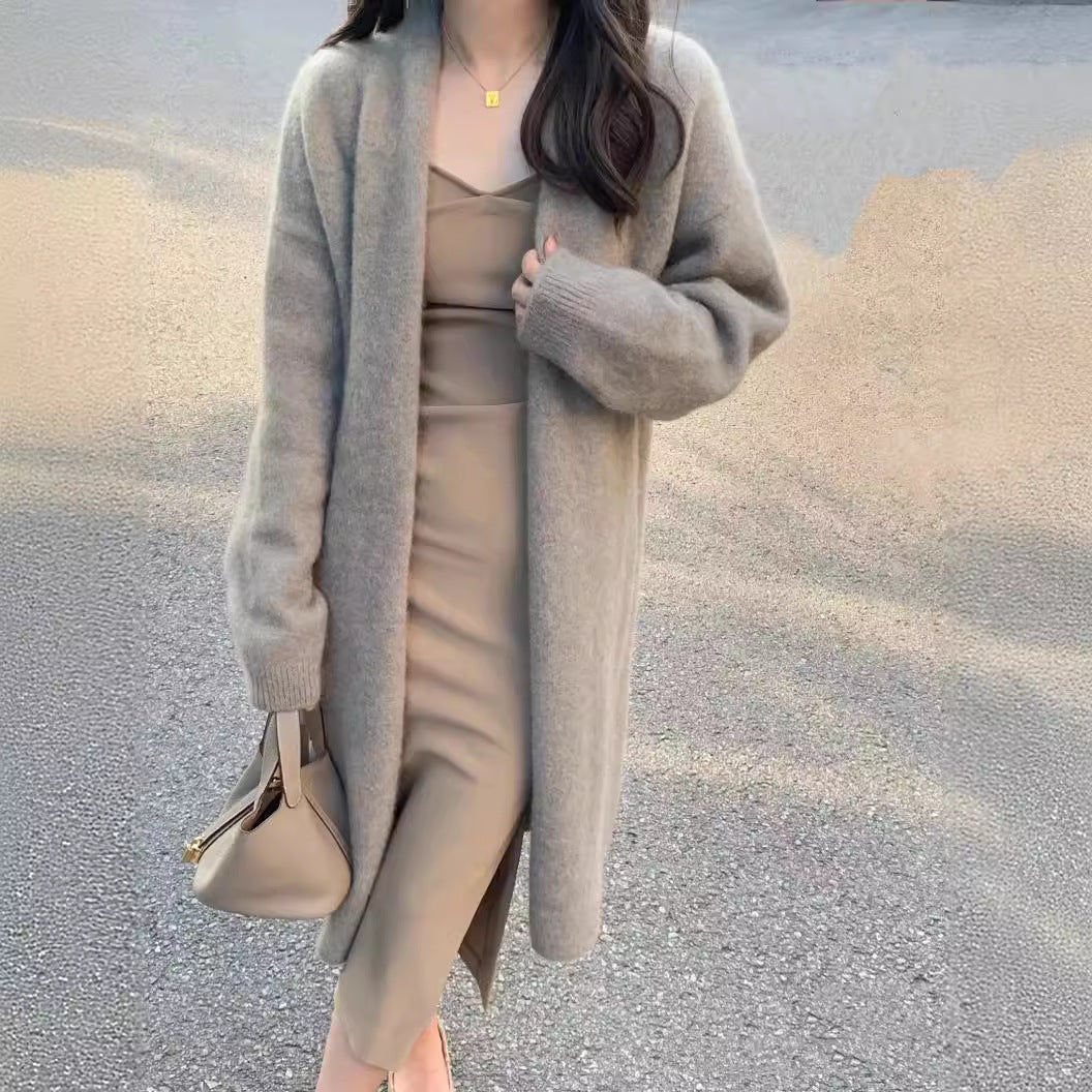 Damer Mjuk stickad cardigan med öppen front och avslappnad passform Mirla-Eva Jonsson