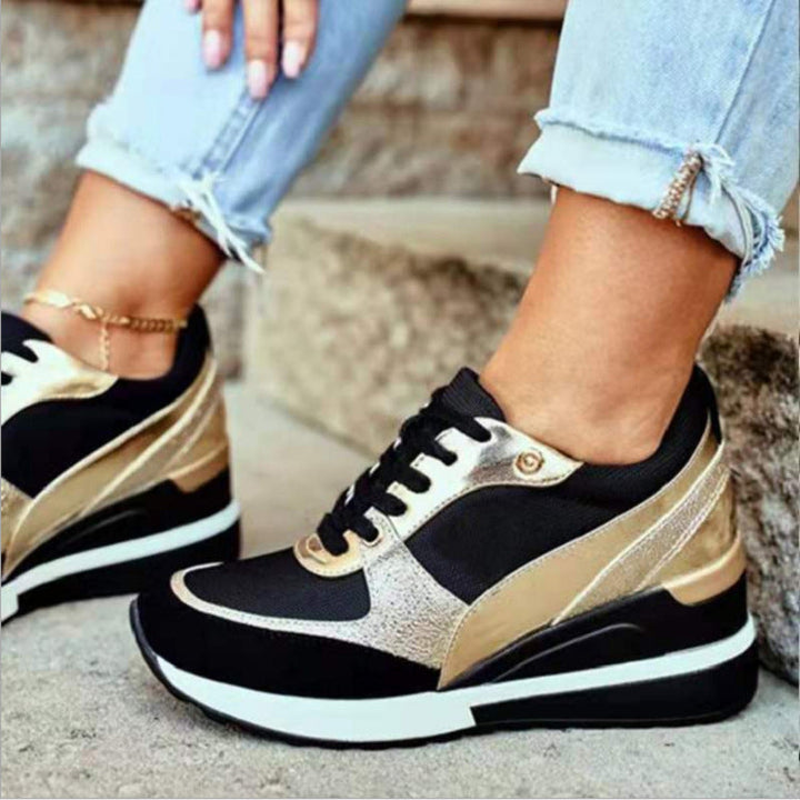 Damer Mode Sneakers med Elegant Metallic Detalj och Sportig Sula Mirla-Eva Jonsson