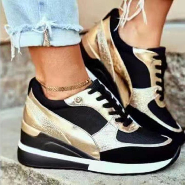 Damer Mode Sneakers med Elegant Metallic Detalj och Sportig Sula Mirla-Eva Jonsson