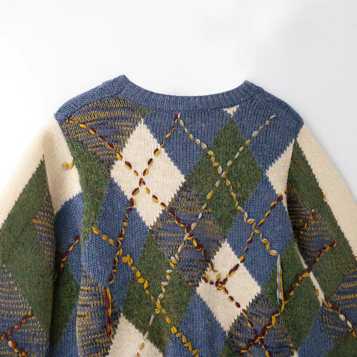 Damer Mode Strickjacka med flätmönster och dekorativ broderi Mirla-Eva Jonsson