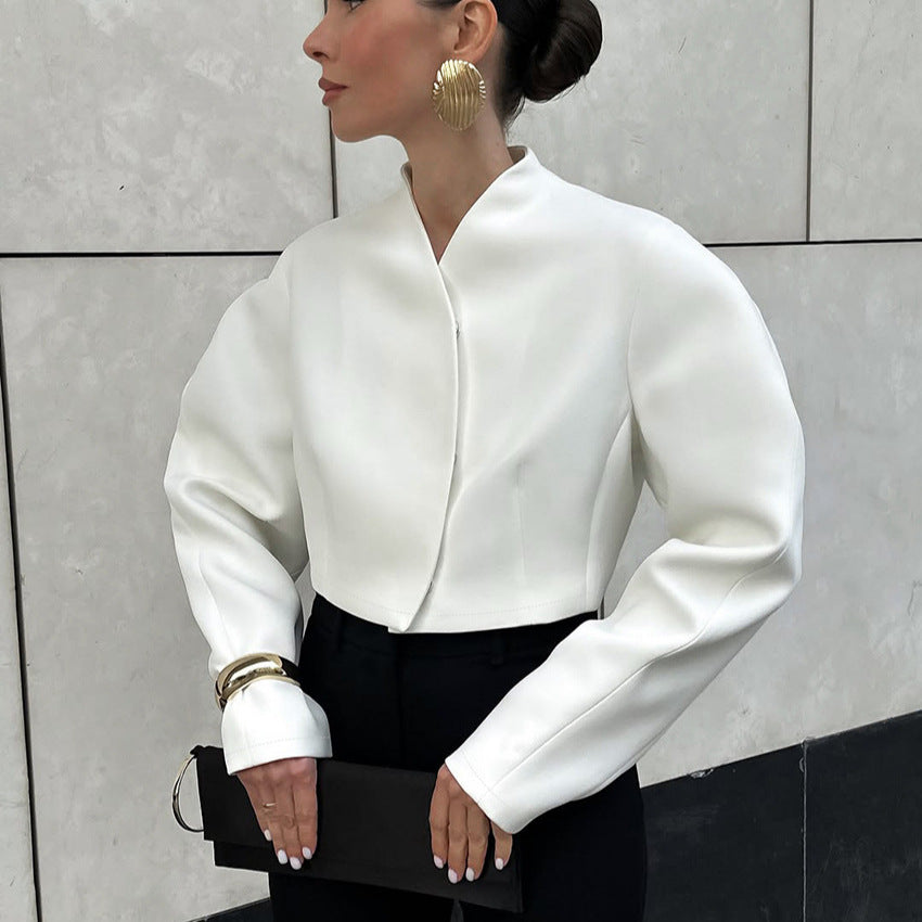 Damer Mode kort jacka med voluminösa ärmar och högkrage Mirla-Eva Jonsson