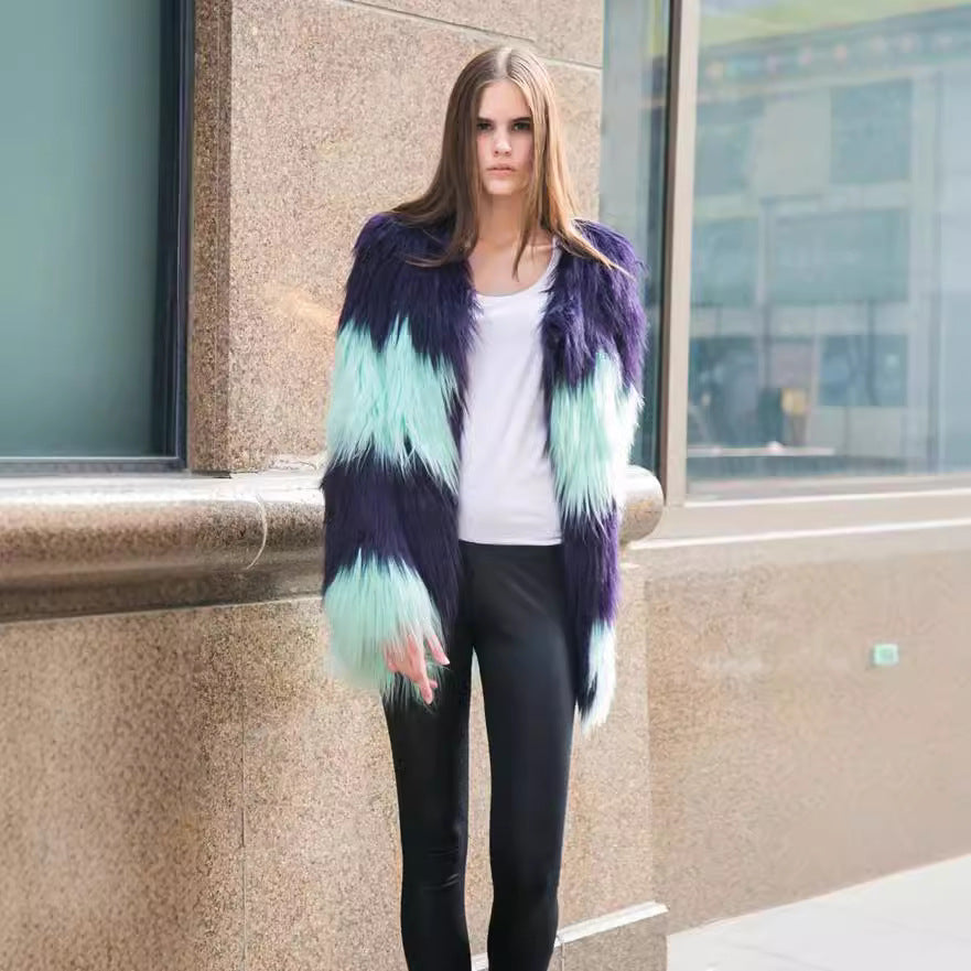 Damer Moderiktig konstpälsblazer med strukturerad design och voluminösa ärmar Mirla-Eva Jonsson