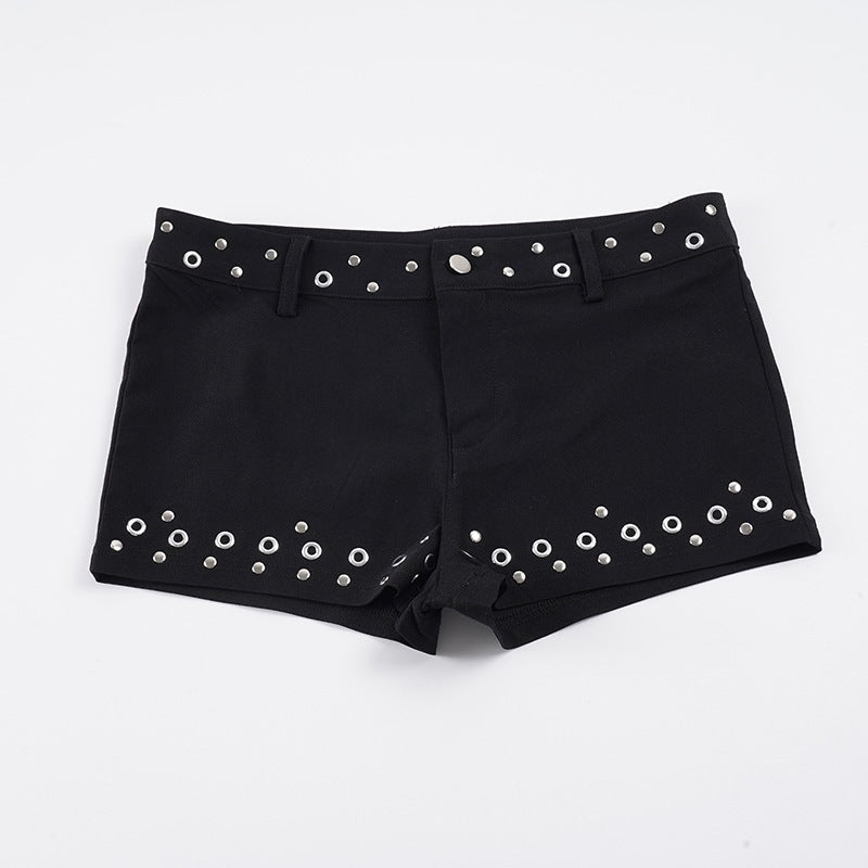 Damer Moderiktiga shorts med dekorativa metalöljetter Mirla-Eva Jonsson