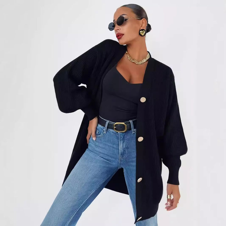 Damer Modern Stickad cardigan med stora knappdetaljer och avslappnad snitt Eva Jonsson-Eva Jonsson