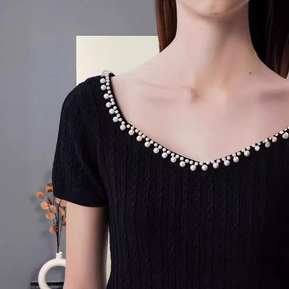 Damer Modernt Crop-Top med elegant Rundhals och dekorativa knapppdetaljer Eva Jonsson-Eva Jonsson