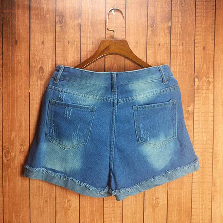 Damer Modiska förstöra denimshorts med kreativa applikationer Mirla-Eva Jonsson