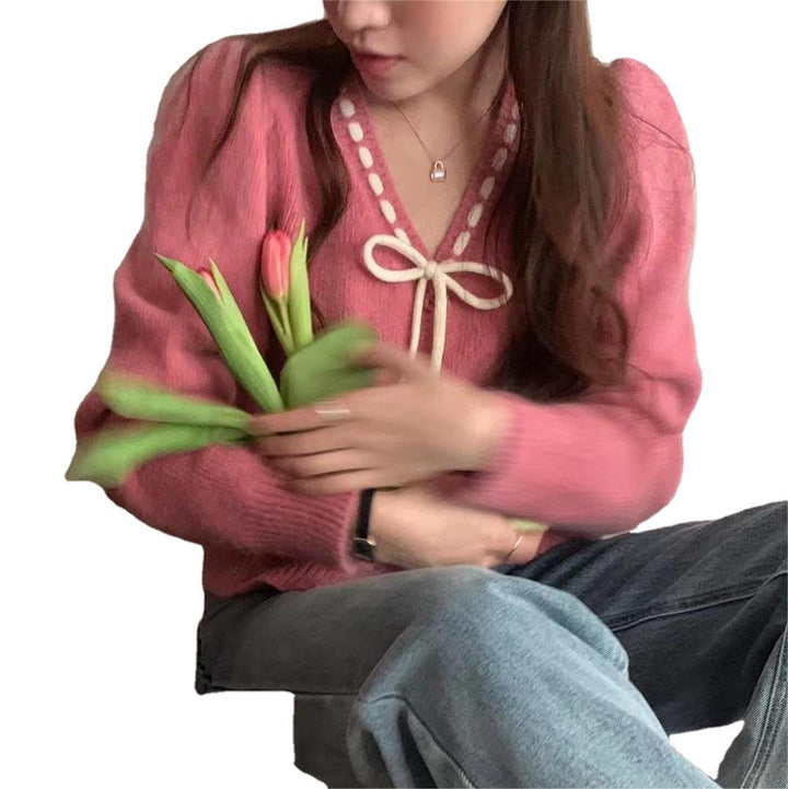 Damer Mysig Kofta med Kontrasterande Knappar och Eleganta Detaljer Mirla-Eva Jonsson