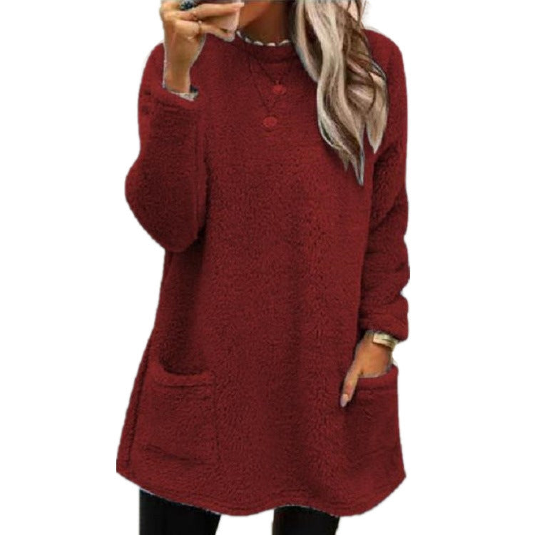 Damer Mysig fleece-tröja med moderiktig rundhalsringning och praktiska fickor Mirla-Eva Jonsson