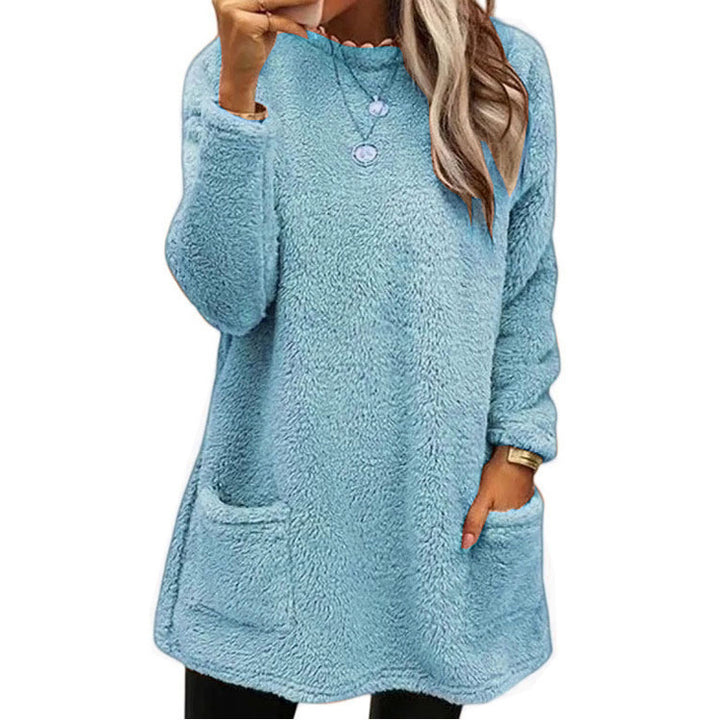 Damer Mysig fleece-tröja med moderiktig rundhalsringning och praktiska fickor Mirla-Eva Jonsson