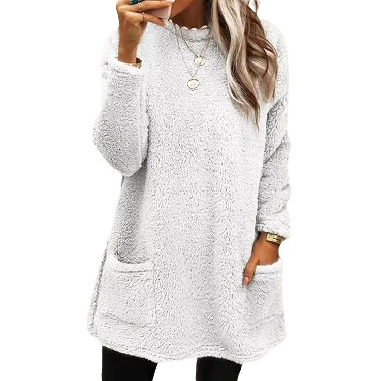 Damer Mysig fleece-tröja med moderiktig rundhalsringning och praktiska fickor Mirla-Eva Jonsson